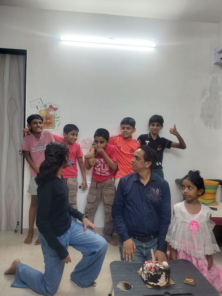 Mr. Deepak Gupta celebrating success with students